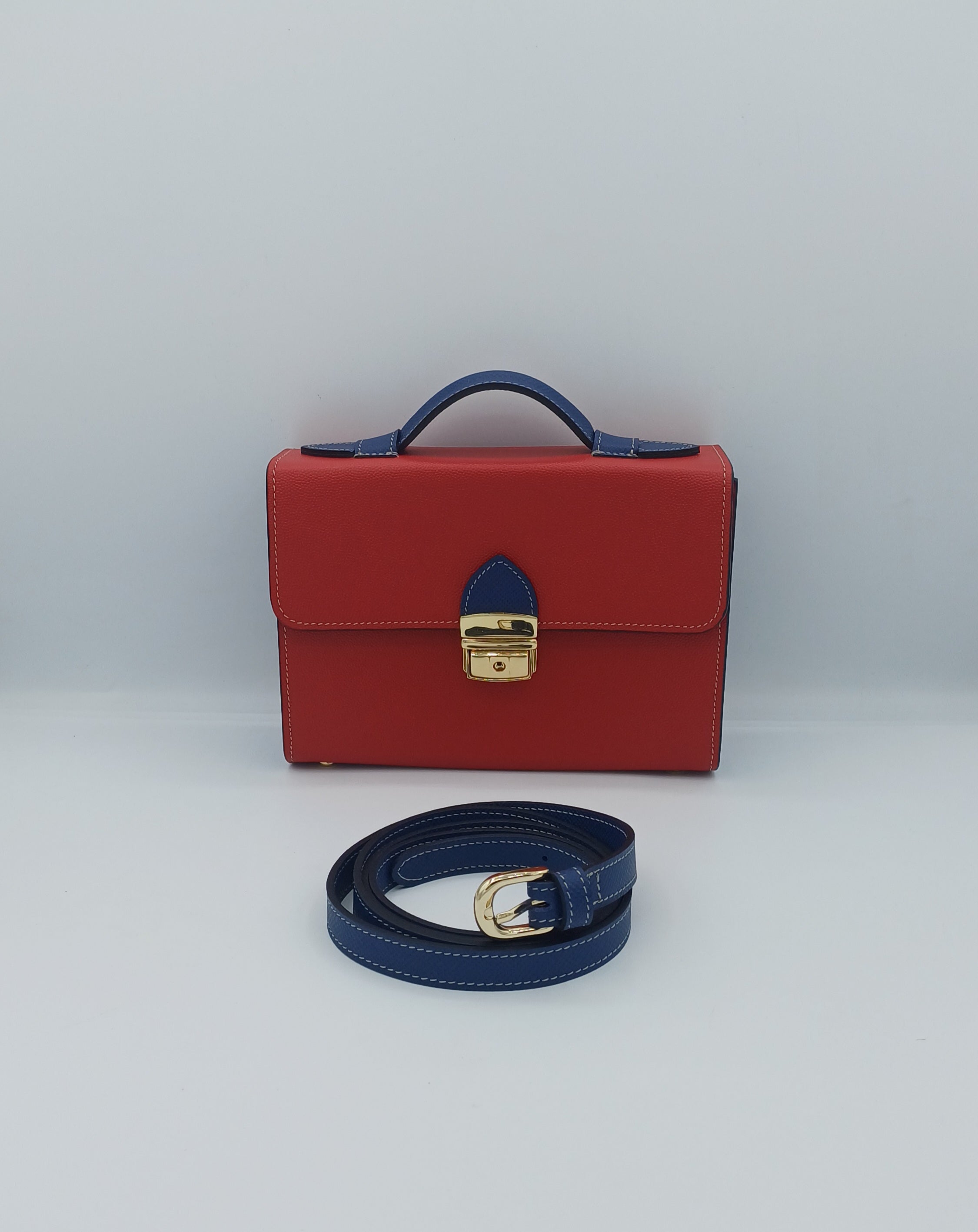 Salomè piccola, color rosso e blu, in pelle Martellata.