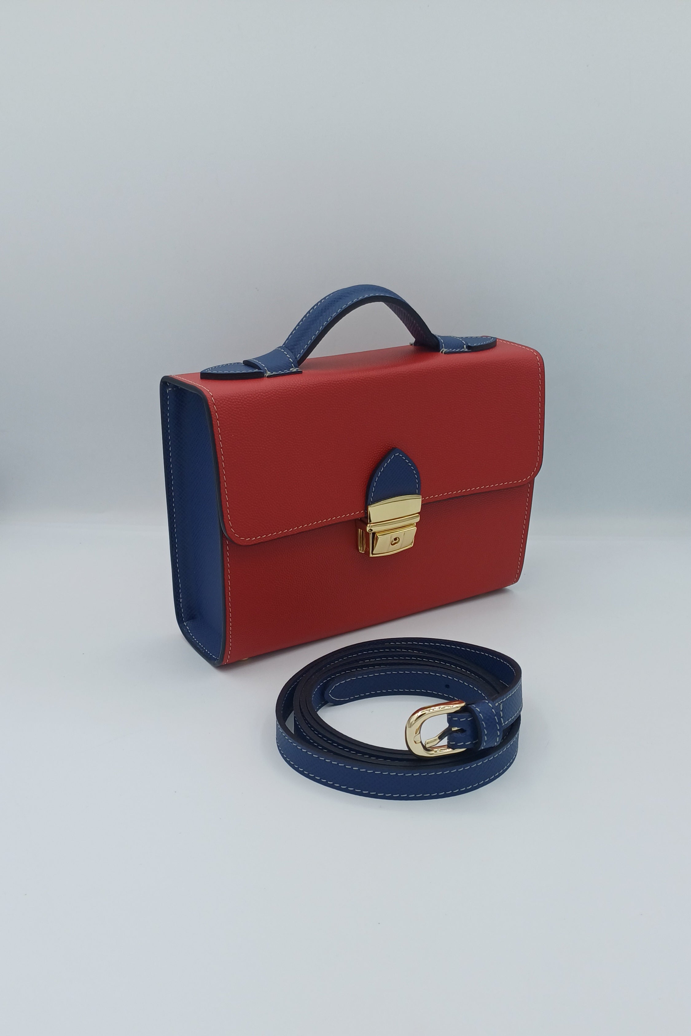 Salomè piccola, color rosso e blu, in pelle Martellata.