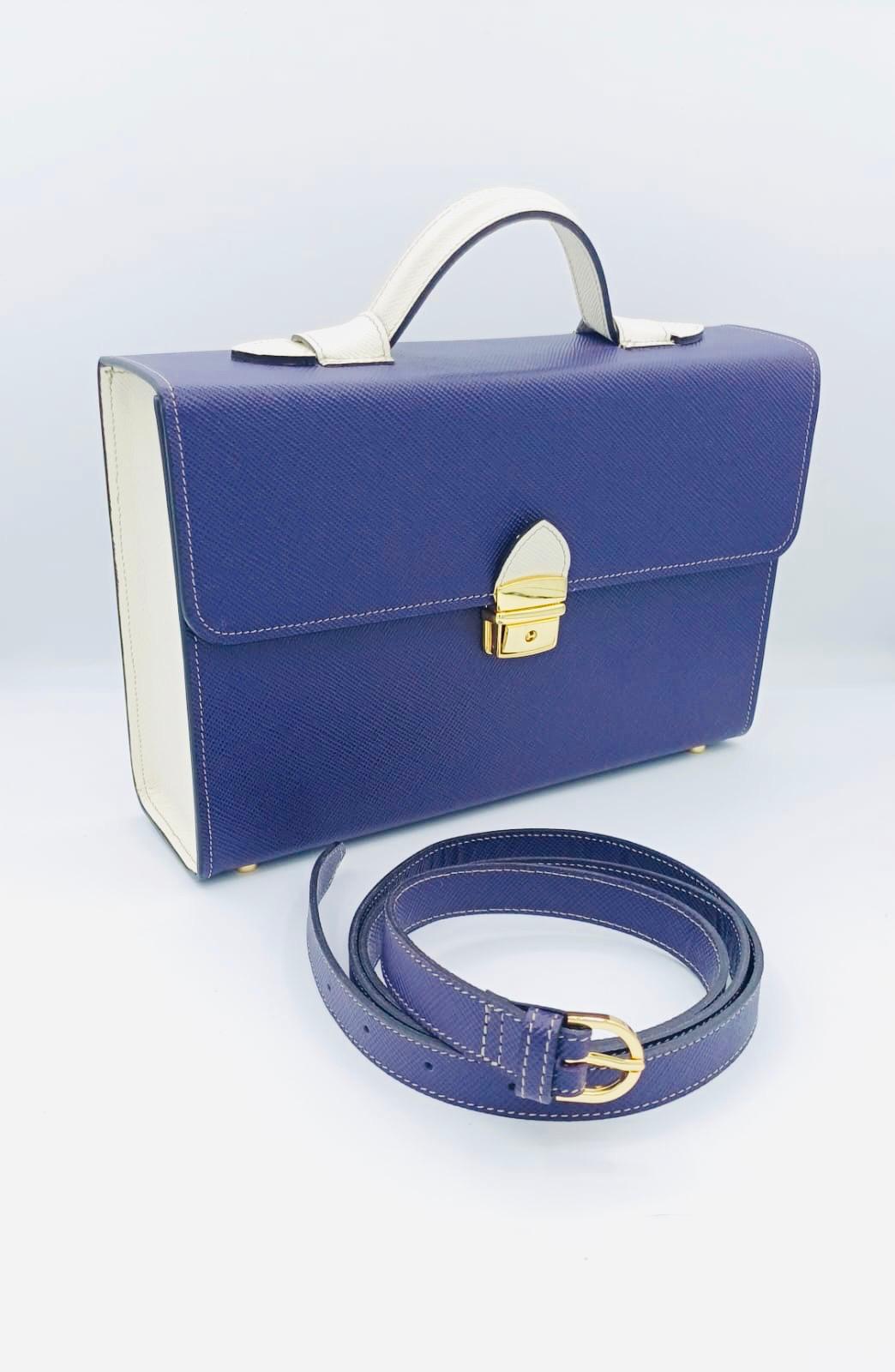 Salomè media, color viola e bianco, in pelle Saffiano.
